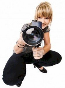 a woman-videographer-who is shooting a video