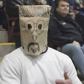 a sports fan with a paper bag over his head