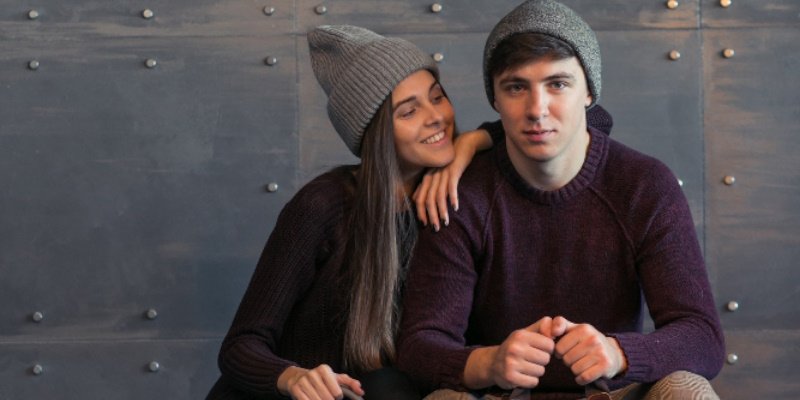 a casual couple fitting in and being modest